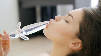 Sweetie plays with toy in bed thumb main